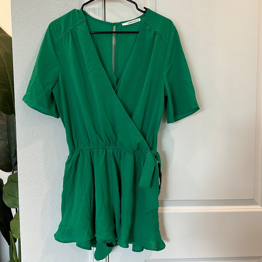 NWOT Caramela Green Romper. Size Medium. Never worn.